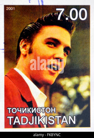 Tadjikistan - circa 2001 : timbres en Tadjikistan montre Elvis Presley, vers 2001 Banque D'Images