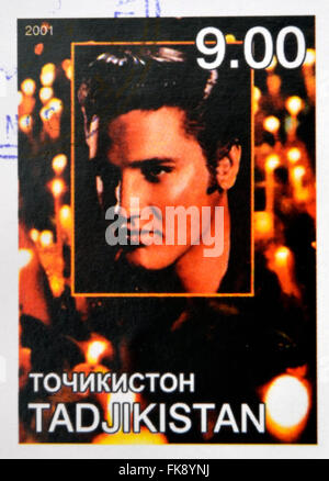 Tadjikistan - circa 2001 : timbres en Tadjikistan montre Elvis Presley, vers 2001 Banque D'Images