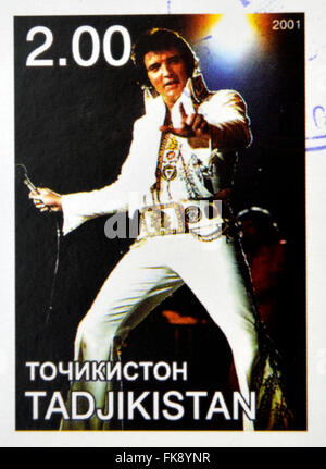 Tadjikistan - circa 2001 : timbres en Tadjikistan montre Elvis Presley, vers 2001 Banque D'Images