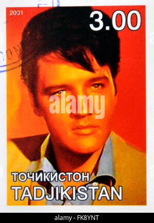 Tadjikistan - circa 2001 : timbres en Tadjikistan montre Elvis Presley, vers 2001 Banque D'Images