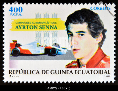 Guinée Équatoriale - circa 1995 : timbre imprimé en Guinée dédié aux champions de voiture, montre Ayrton Senna, circa 1995 Banque D'Images