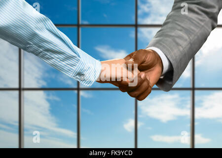 Office manager shaking woman's hand. Banque D'Images