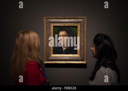 Royal Academy of Arts, Londres, Royaume-Uni. 8 mars, 2016. Portrait d'un homme, le Portrait de Terris. Les membres du personnel de la galerie vues l'un des deux seuls tableaux de l'exposition RA directement attribuables à Giorgione, un artiste dont on sait peu de choses. À l'âge de Giorgione, une enquête de la Renaissance vénitienne durant la première décennie du xvie siècle. Credit : artsimages/Alamy Live News Banque D'Images