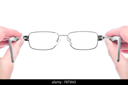 Verres dans la main. Banque D'Images