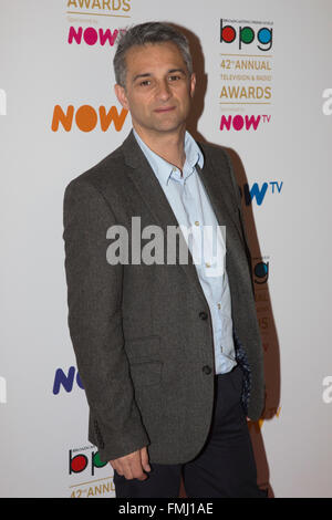 Londres, Royaume-Uni. 11 mars 2016. Dave Directeur Nath. L'arrivée des célébrités Tapis rouge pour la 42e remise des prix de la télévision et de la Radio déjeuner organisé par le Broadcasting Press Guild parrainé par NOW TV au Theatre Royal Drury Lane. Banque D'Images