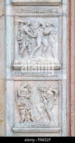 Expulsion du Paradis, Adam et Eve, le panneau sur la porte centrale de la Basilique San Petronio à Bologne, Italie Banque D'Images