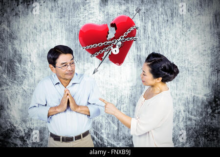 Image composite de l'older asian couple having an argument Banque D'Images