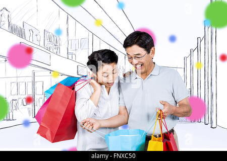 Image composite de l'older asian woman with shopping bags Banque D'Images