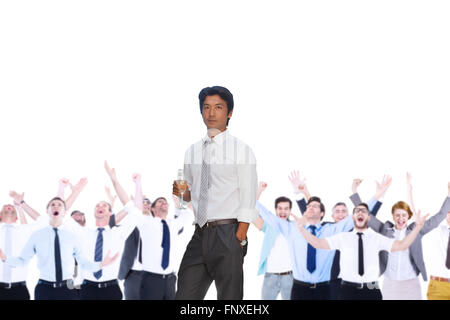 Composite image of man looking at camera holding champagne flute Banque D'Images