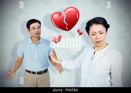 Image composite de l'older asian couple having an argument Banque D'Images