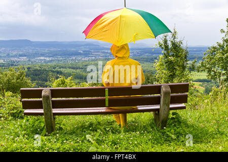 Fille dans la pluie Banque D'Images