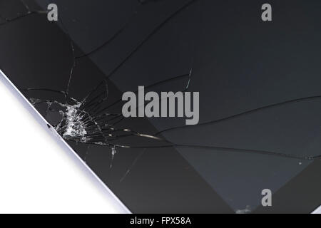 Un ordinateur tablette cassée comme détaillé gros plan sur fond blanc neutre Banque D'Images