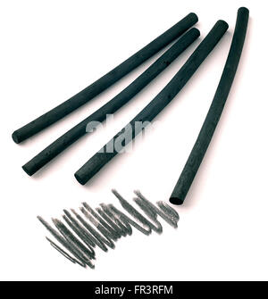 Quatre baguettes de charbon de dessin Banque D'Images