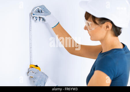 Mur de mesure architecte avec ruller flexible Banque D'Images