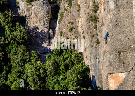 Climber au coucher du soleil Banque D'Images