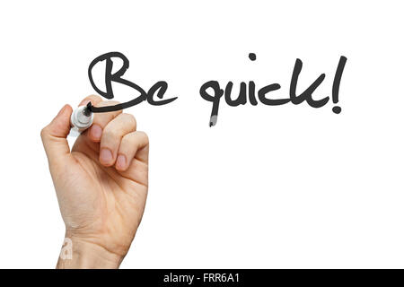 Être rapide de phrase à la main sur tableau blanc Banque D'Images