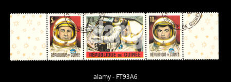 Timbres-poste de Guinée illustrant les principaux Virgil I. Grissom, le lieutenant Com. John W. Les jeunes, tant dans le vaisseau Gemini 2. Banque D'Images