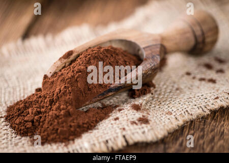 Partie de la poudre de cacao (selective focus) comme détaillé close-up shot Banque D'Images