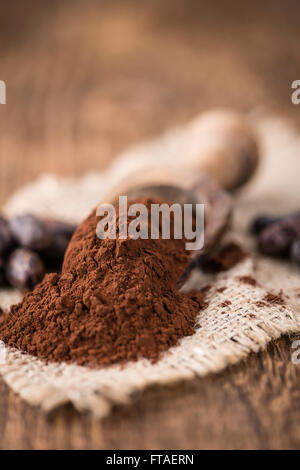 Partie de la poudre de cacao (selective focus) comme détaillé close-up shot Banque D'Images