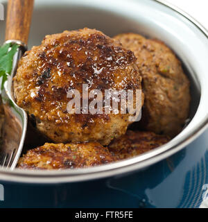 Petites galettes de viande ou de saucisse escalopes Banque D'Images