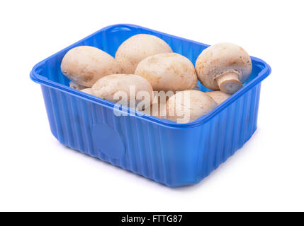 Les champignons en boîte en plastique bleu isolated on white Banque D'Images