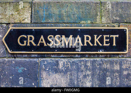 Une direction fléchage Grassmarket à Édimbourg, en Écosse. Banque D'Images