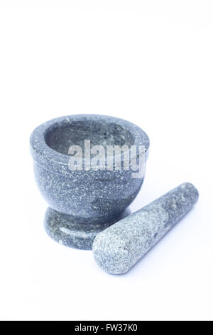 Mortier et pilon en pierre sur fond blanc, stock photo Banque D'Images