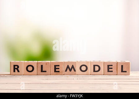 Rolemodel signe fait de dés sur une table Banque D'Images