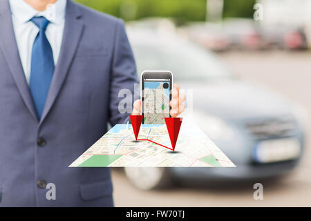 Close up of business man with smartphone navigator Banque D'Images