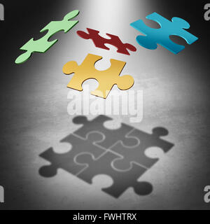 Mettre les pièces du casse-tête d'équipe concept comme un succès de l'entreprise symbole avec quatre pièces d'un puzzle en vol Banque D'Images