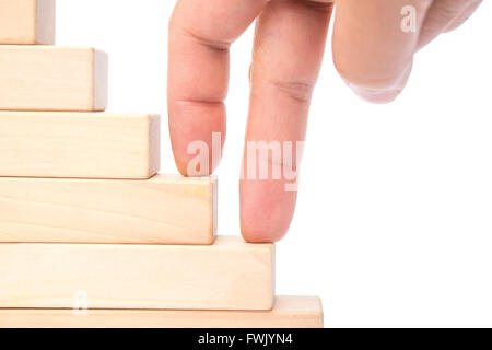 Grimper les escaliers composée par des blocs de bois sur white with clipping path Banque D'Images