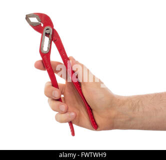 Main de l'homme avec un plombier clé rouge, isolé Banque D'Images