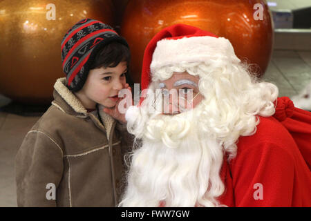 Rencontre garçon Pic Santa Clause Peter Devlin Banque D'Images