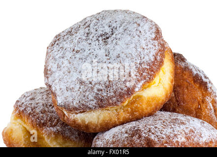 Les beignets sur une plaque noire, chemin de détourage, gros plan Banque D'Images