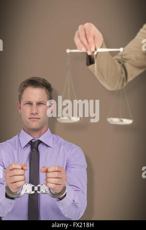 Composite image of young woman holding balance de la justice et un marteau Banque D'Images