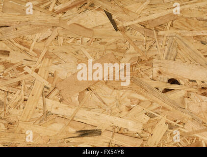 Fond de bois aggloméré, de petits morceaux de mise à plat Banque D'Images