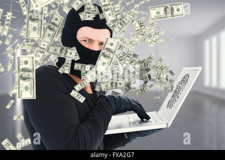 Image composite de hacker à l'aide d'ordinateur portable à l'identité voler Banque D'Images