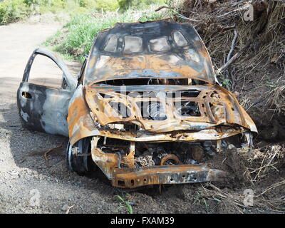 Burnt Out abandonné voiture Ford volé à partir de l'incendie Banque D'Images