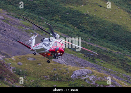 D'exploitation d'hélicoptères de la Garde côtière HM, Snowdonia dans le Nord du Pays de Galles. Banque D'Images