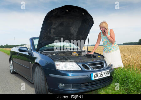 Femme avec voiture ventilées Banque D'Images