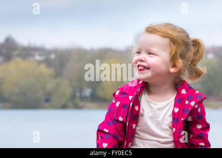 Cute toddler sticking tongue out Banque D'Images