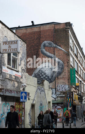 L'art de rue d'un oiseau par un artiste de rue belge Roa, cette pièce est dans le Hanbury Street. Banque D'Images