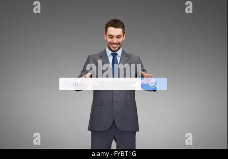 Businessman working avec barre de recherche internet Banque D'Images