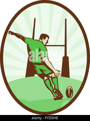 Rugby player kicking ball au poteau de but Banque D'Images