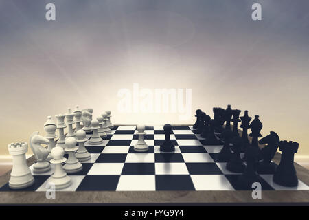 Image composite de pièces d'échecs noir et blanc à bord Banque D'Images
