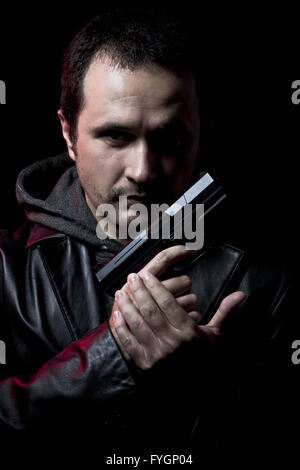 Ganster, homme dangereux avec une arme à feu, le tir Banque D'Images