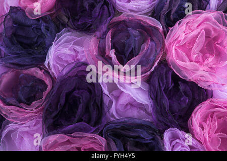 Fond de fleurs roses et mauves de cloth Banque D'Images