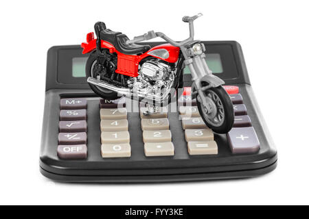 Calculatrice et toy motorbike Banque D'Images