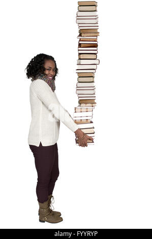 Woman holding books Banque D'Images