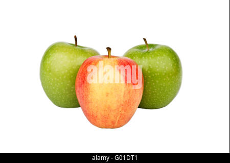 Une pomme rouge et deux pommes vertes Banque D'Images